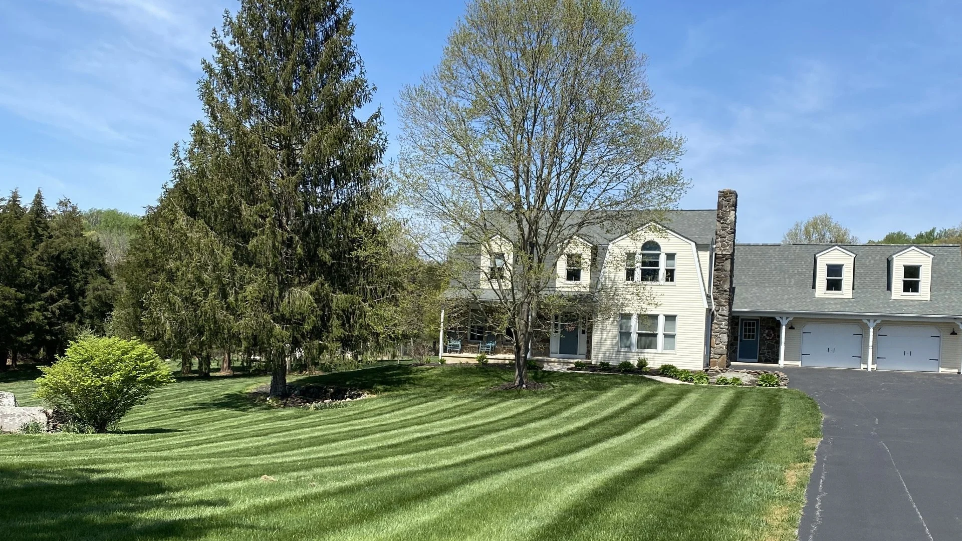 House with a healthy green lawn in Westminister, MD.