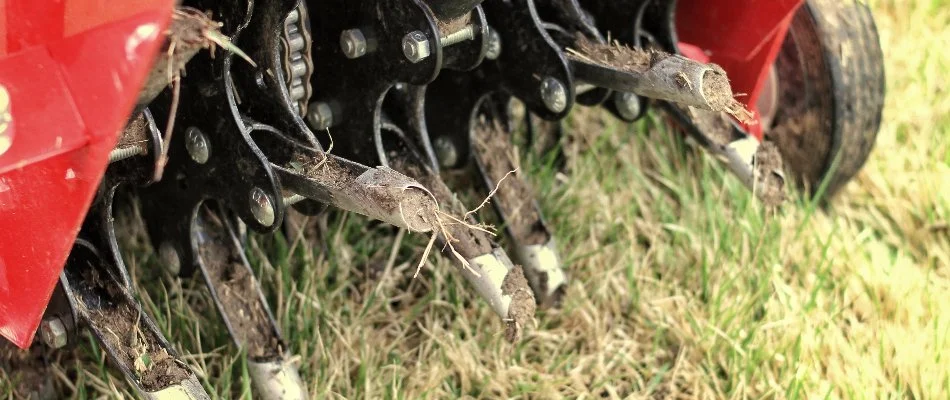 Aerator machine on a lawn in Westminster, MD.