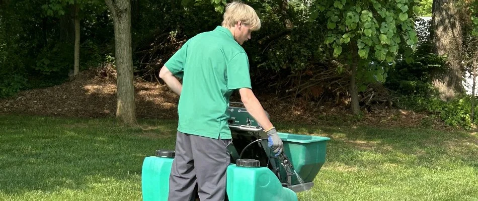 Liqua-Grow Turf employee in Eldersburg, MD on a fertilization machine.