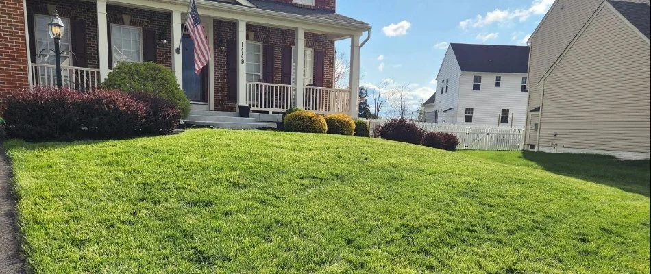 House and shrubs in Green Valley, MD, behind a lawn.